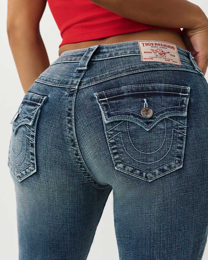 Woman wears true religion capri jeans, a red tank top, and black pumps